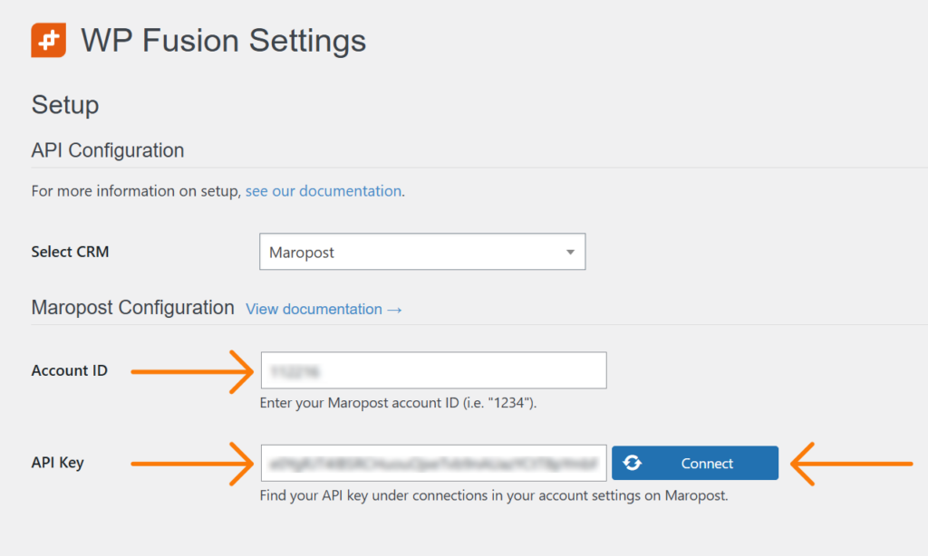 screenshot of the wp fusion settings interface on wordpress, displaying api configuration for maropost. it features fields for account id and api key, complemented by a connect button. arrows guide users to input their account id and api key seamlessly.